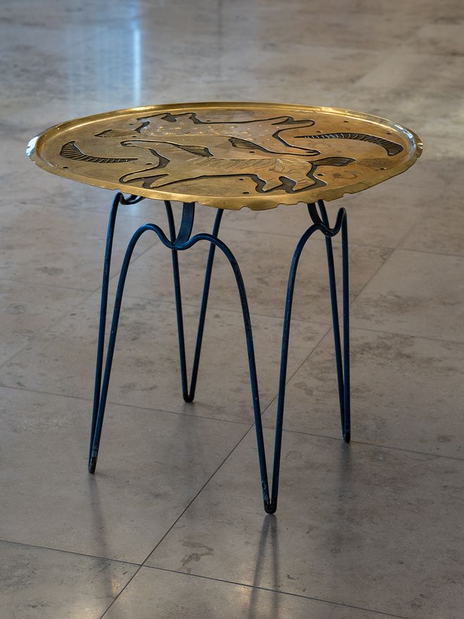 Helena Tynell brass table at Hotel Vaakuna