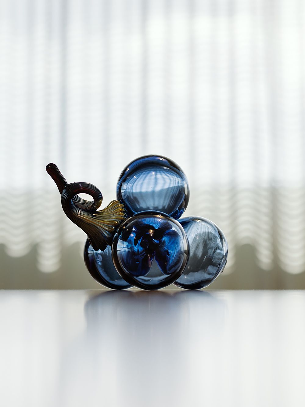 Playful vegetables and fruits flourish in Oiva Toikka's glass