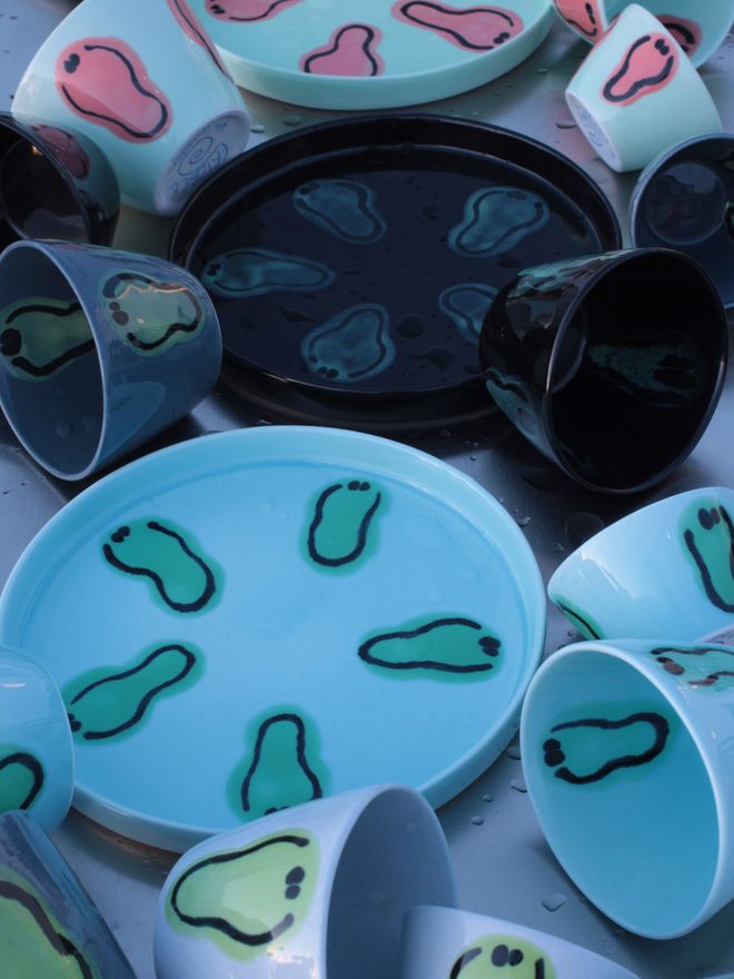 Close-up of Frizbee Ceramics' tableware, both plates and mugs