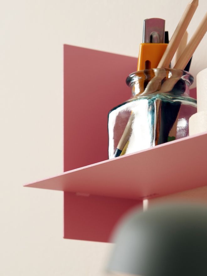A detail of TIPTOE’s pink PLI wall shelf
