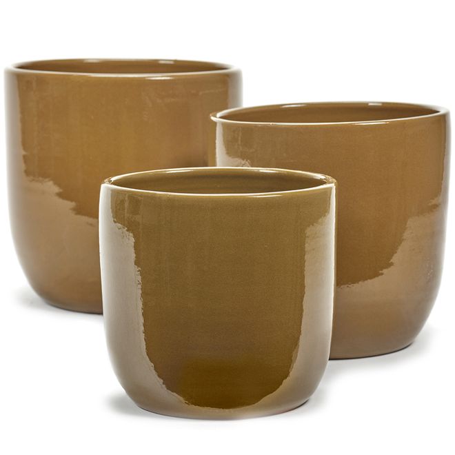 Serax's Glazed Shade pots in a honey color.