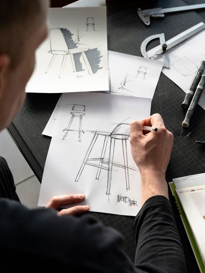 David Geckeler at this drawing board, sketching the Nerd Bar stool.