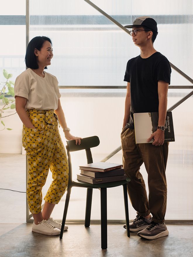 Joy Loo and Khoo Kean Hu with Vitra's All Plastic Chair
