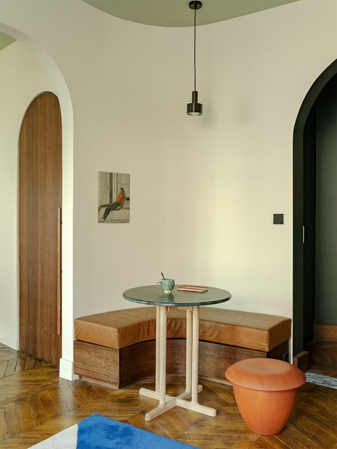 An image of an apartment in Paris, Lunain, designed by architect Louis Denavaut. The image features the living room decor. 