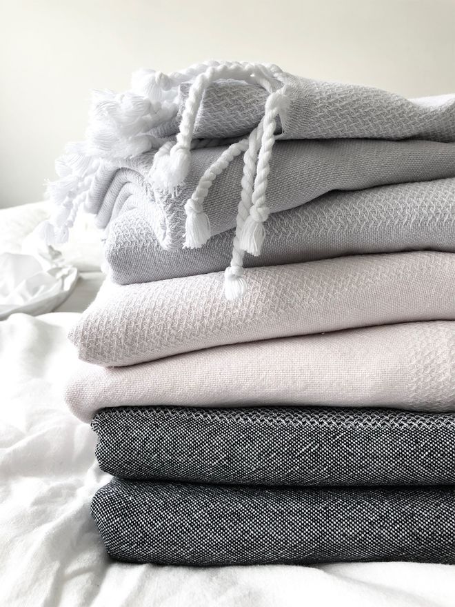 Langø cotton towels folded into a pile.