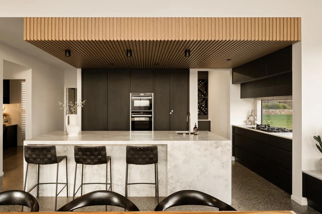 Project Mount Rascal (Modern kitchen with black cabinets, marble island, wooden ceiling, and bar stools. Minimalist design)
