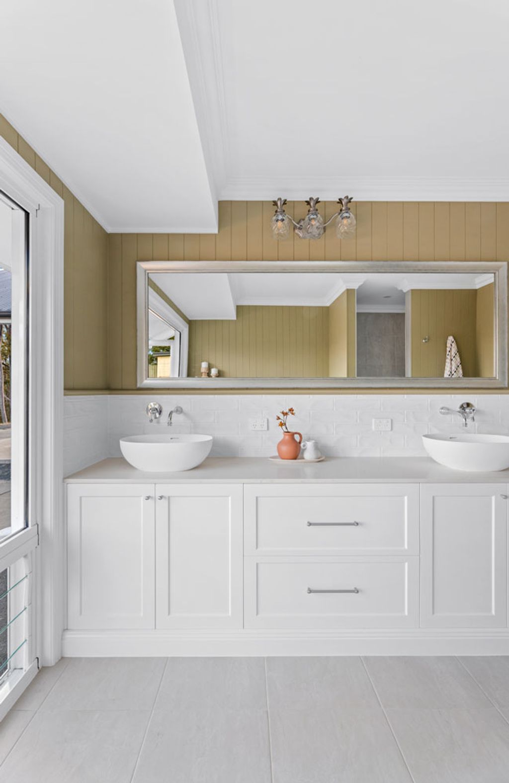 Queenie Marlow (Wide mirror above a bathroom sink)