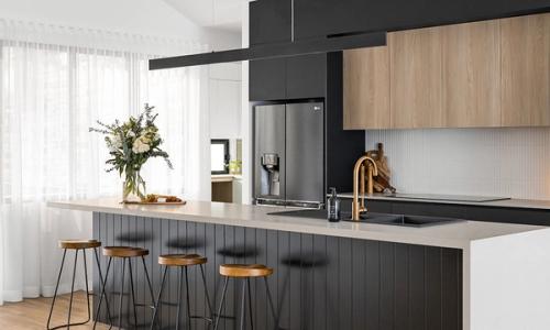 The Summit House (Black slat island with stone benchtop, kit-kat splashback and brushed gold tap)