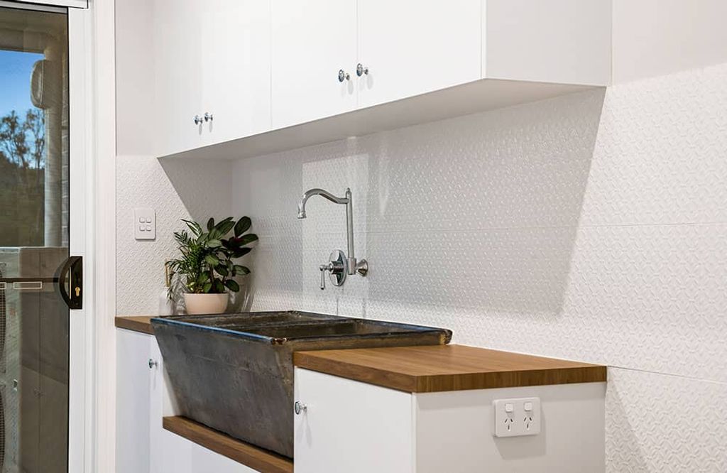 Project Flagstone (black sink and white cabinet)
