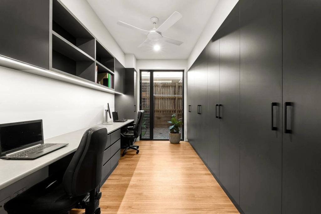 Project Thurston (Long office table with black cabinet on right side)