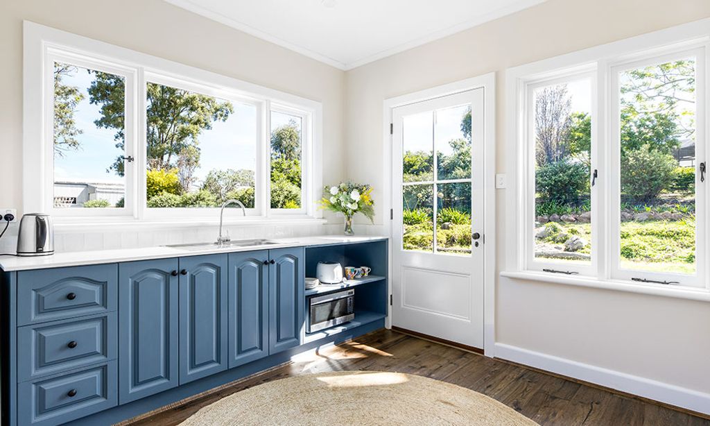 Homestead Living (Kitchen with Backyard View)