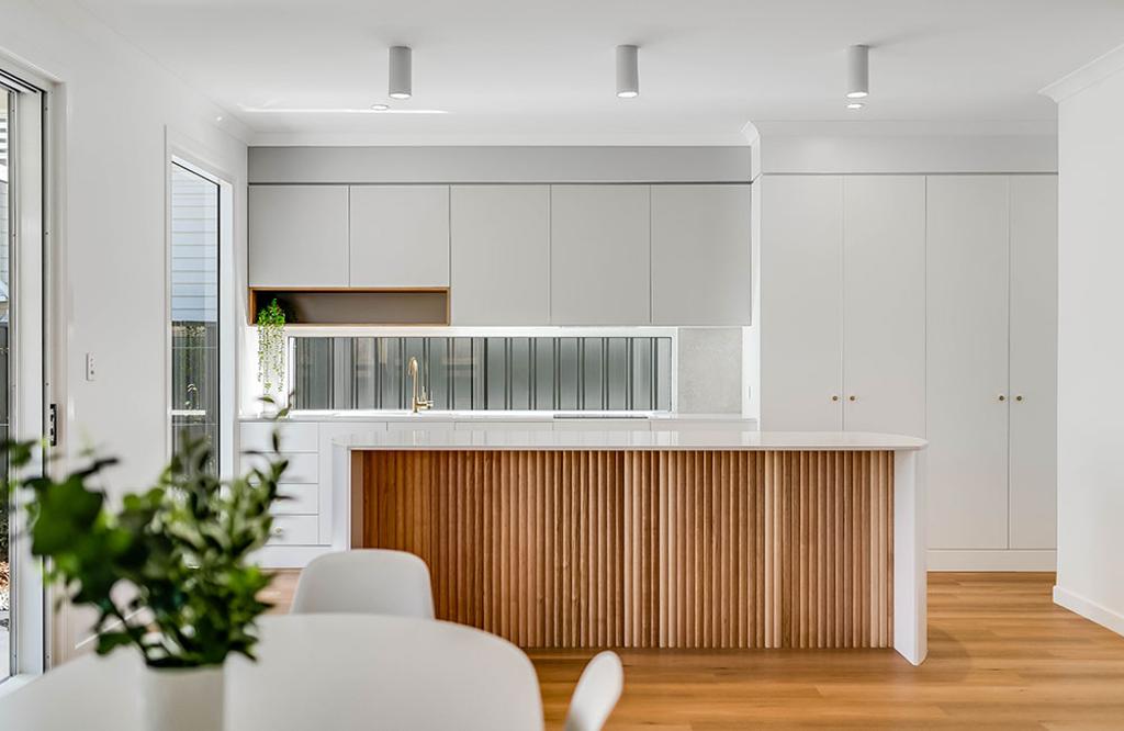 Cranley 2.0 (dining area view white cabinets and kitchen)