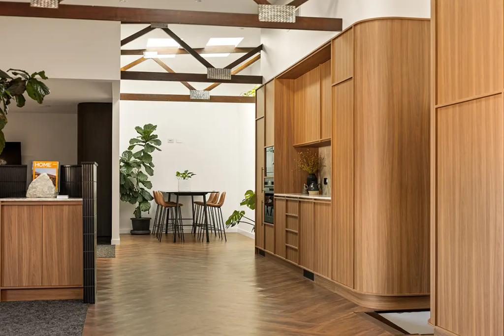 Modern office with timber finishes and display shelves