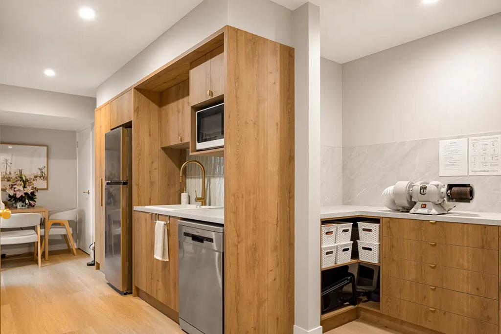 Lavish Constructions - Sole Podiatry (Clinic kitchenette and workspace with wood cabinets.)