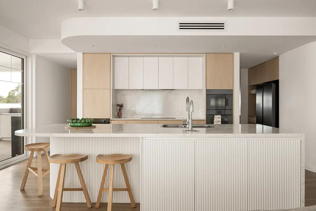 Cheltenham (Modern kitchen with marble island and wood stools)