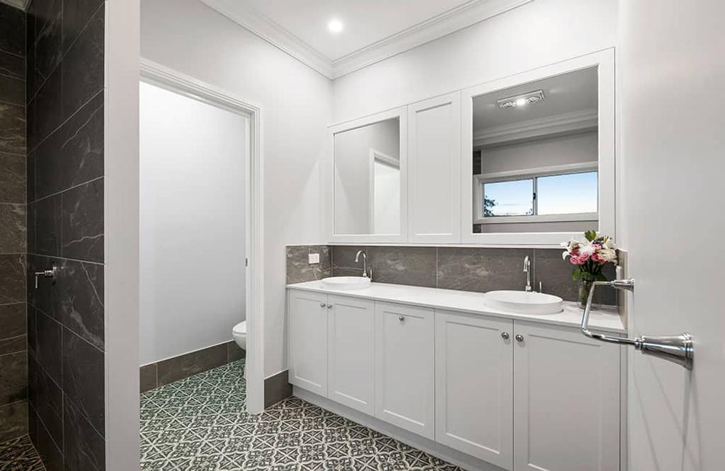 Project Flagstone (white colored bathroom)