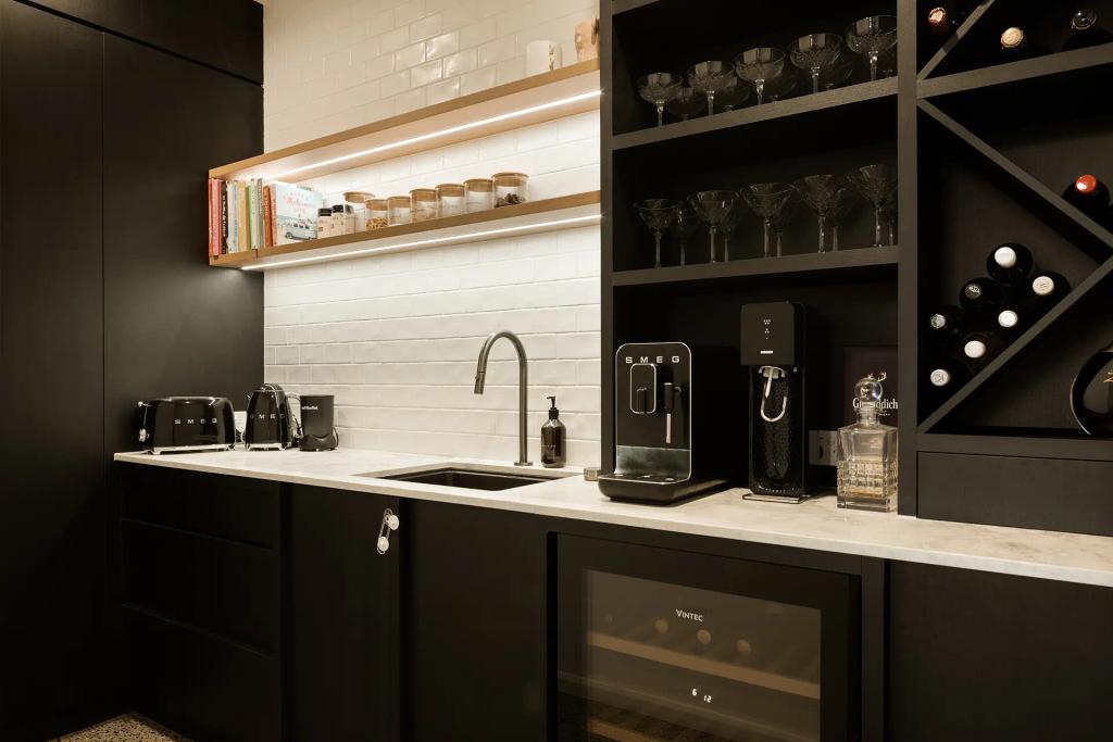 Project Mount Rascal (Modern kitchen with black cabinetry, white subway tile backsplash, and Smeg appliances on the countertop)