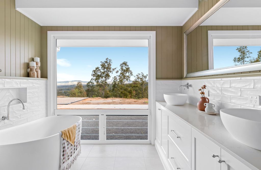 Queenie Marlow (Modern bathroom with an outdoor view through the window)
