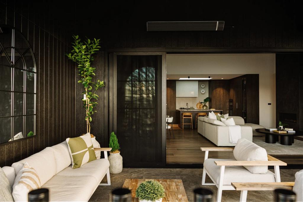 Lavish Morada (Open-concept space with cozy patio seating and view into modern kitchen and living room.)