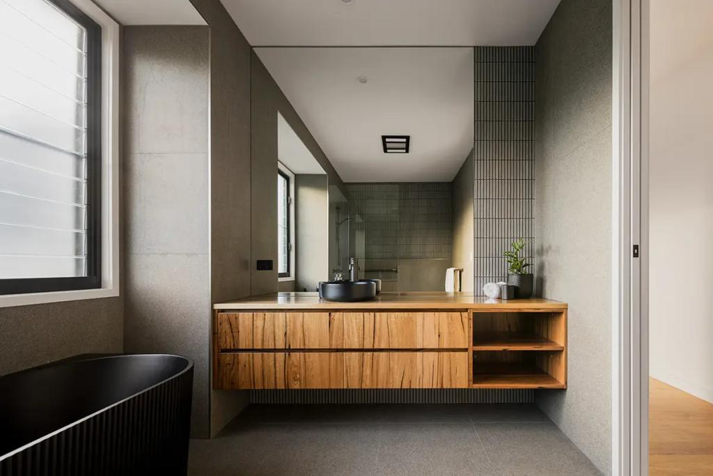 Project Treevue (Modern bathroom with a wooden vanity and a large mirror)