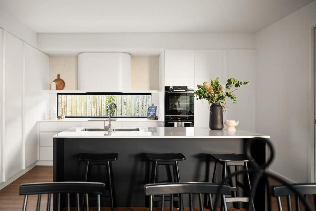 Project Ward (Modern kitchen with a large white island, black barstools, white cabinetry, an integrated oven, and a decorative plant arrangement on the counter)