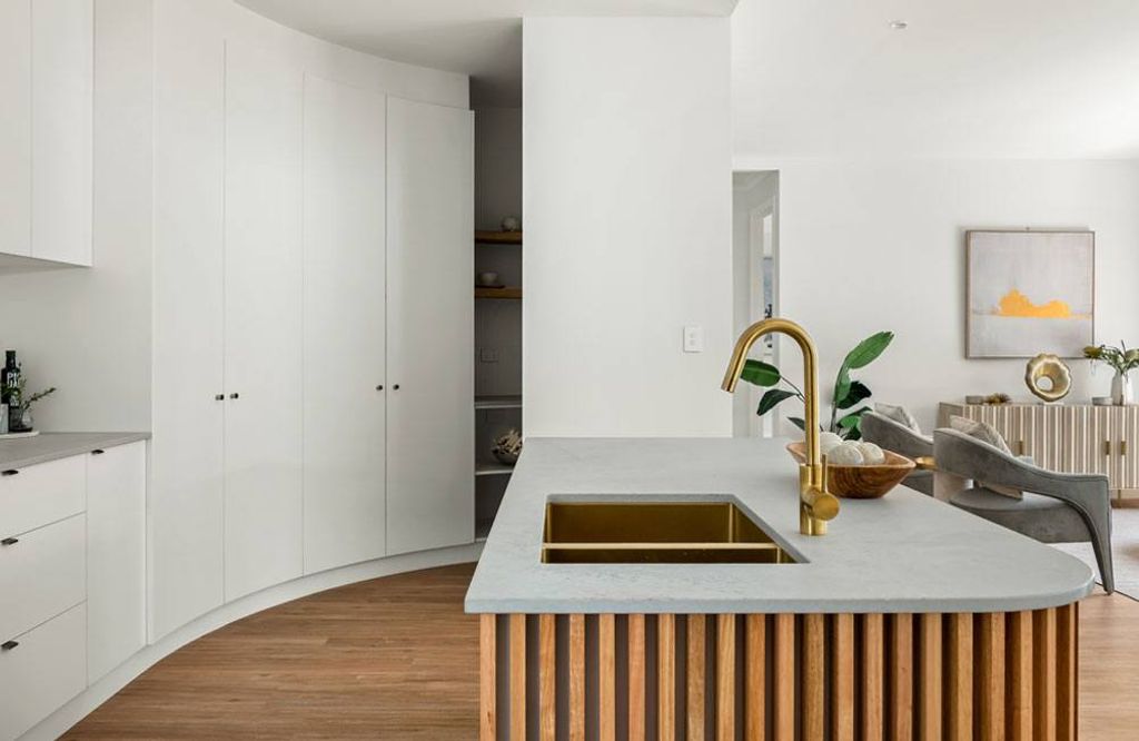 Project Drummond (Drummond street white cabinets and sink of the kitchen)
