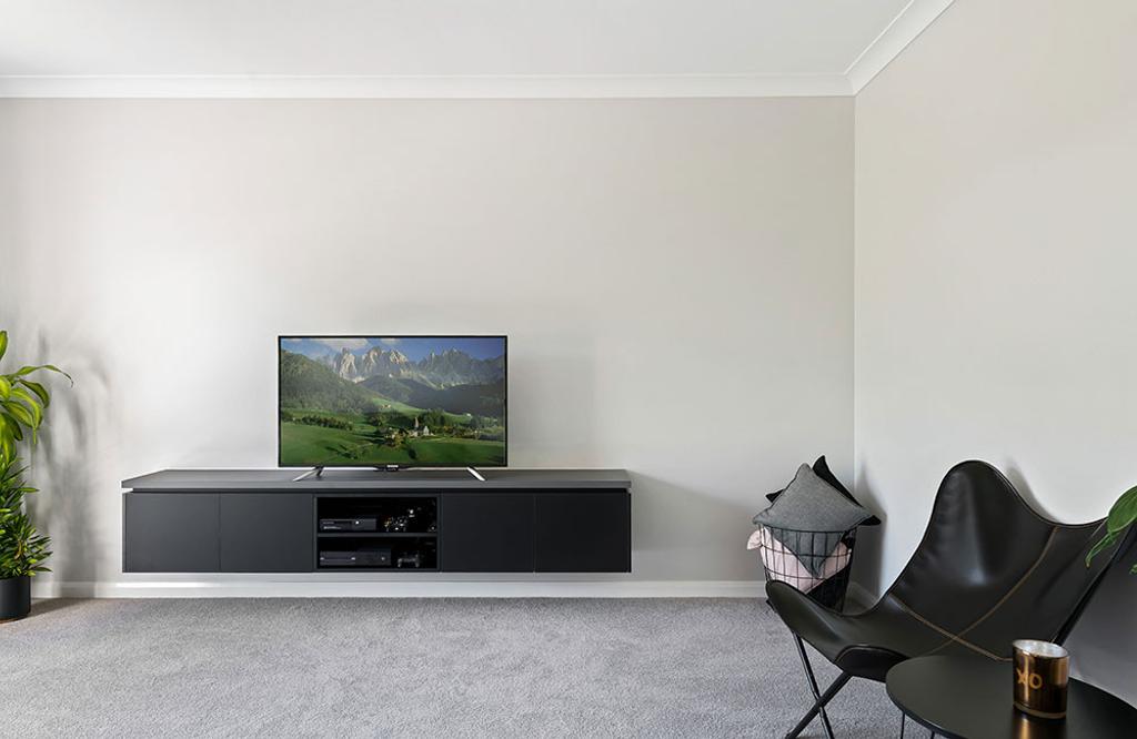 Project Tremorne (minimalist white wall and black TV cabinet)