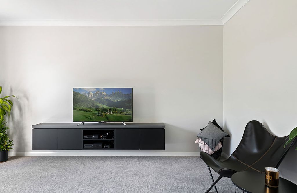 Project Tremorne (minimalist white wall and black TV cabinet)