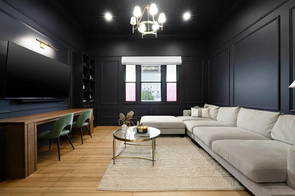 Project Franklin (Living room with black walls and light furniture.)