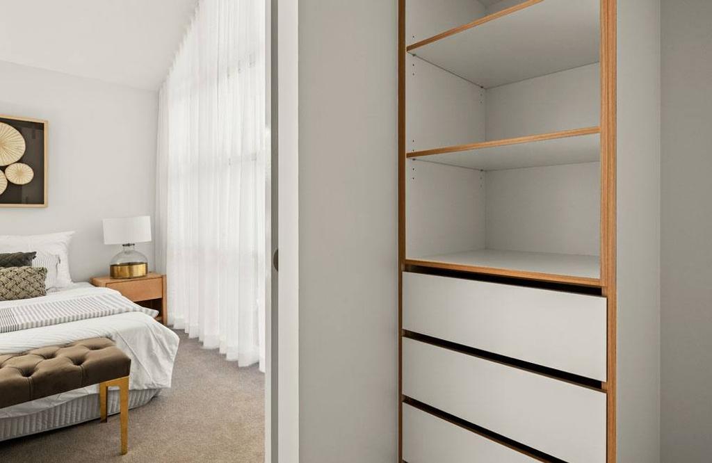 Project Drummond (Drummond street bedroom's half view and a white cabinet)