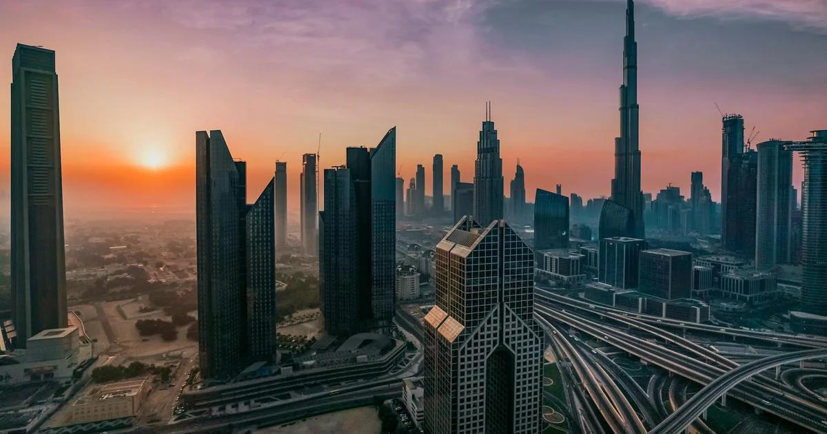 AI-powered entrepreneurs in a futuristic cityscape utilizing advanced data interfaces and smart systems for business growth and innovation.