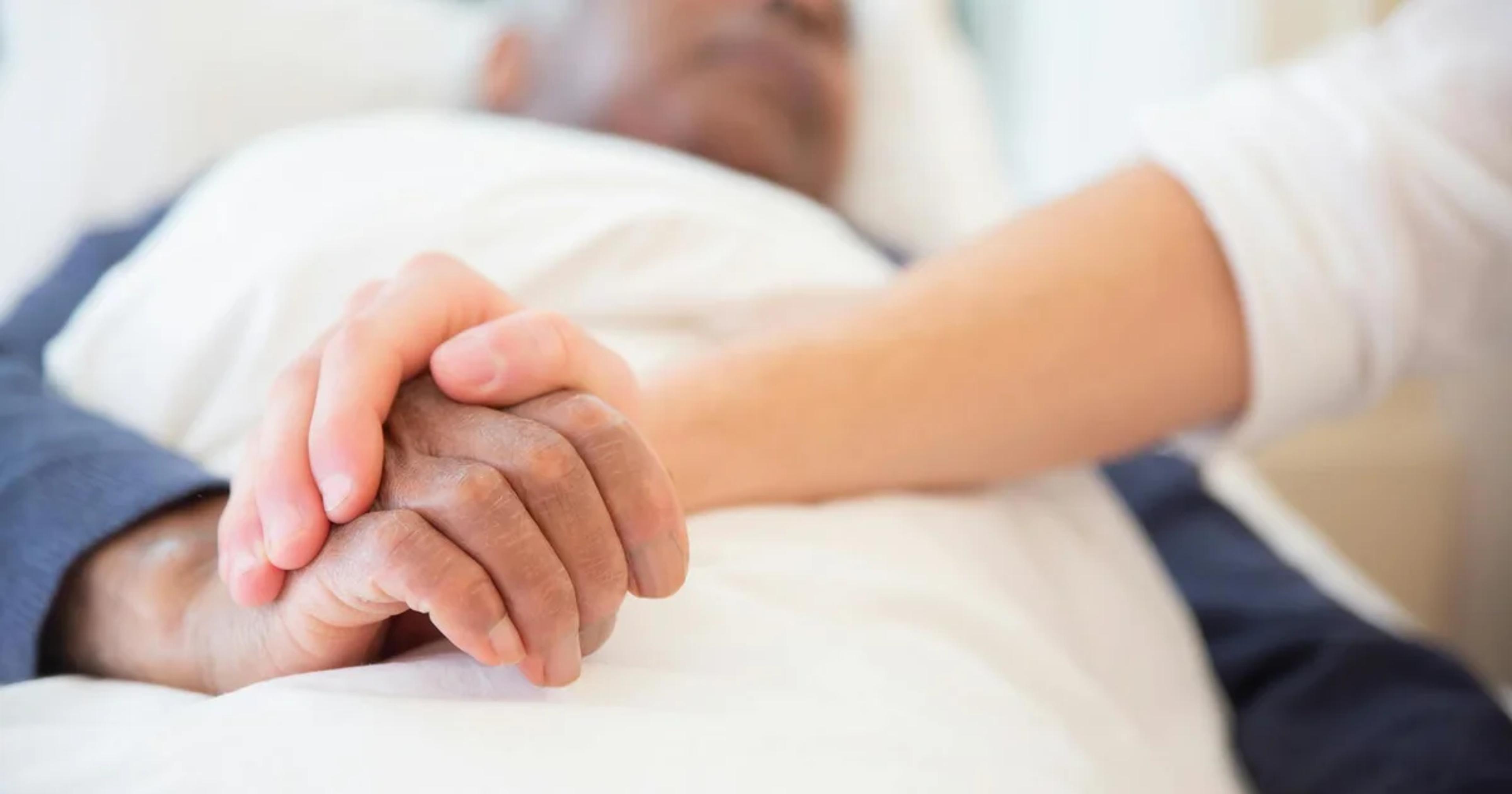 A modern, compassionate healthcare setting integrating advanced digital monitoring technology for patient care.