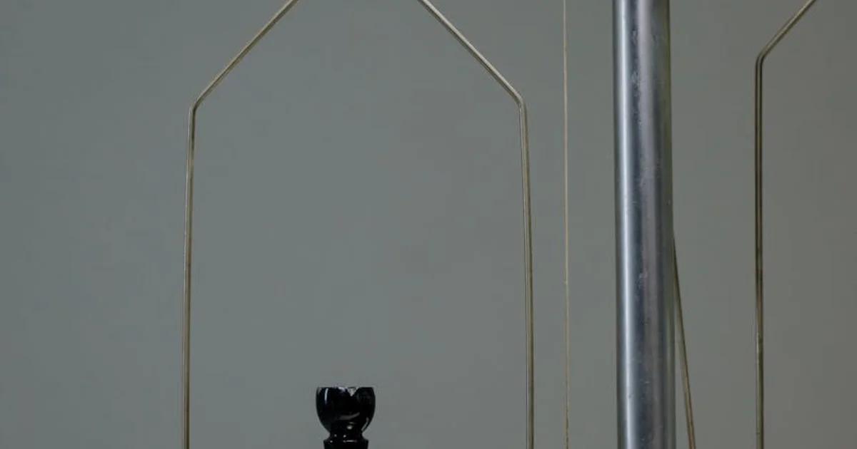 A conceptual image showing the balance between AI hype and its real-world applications.