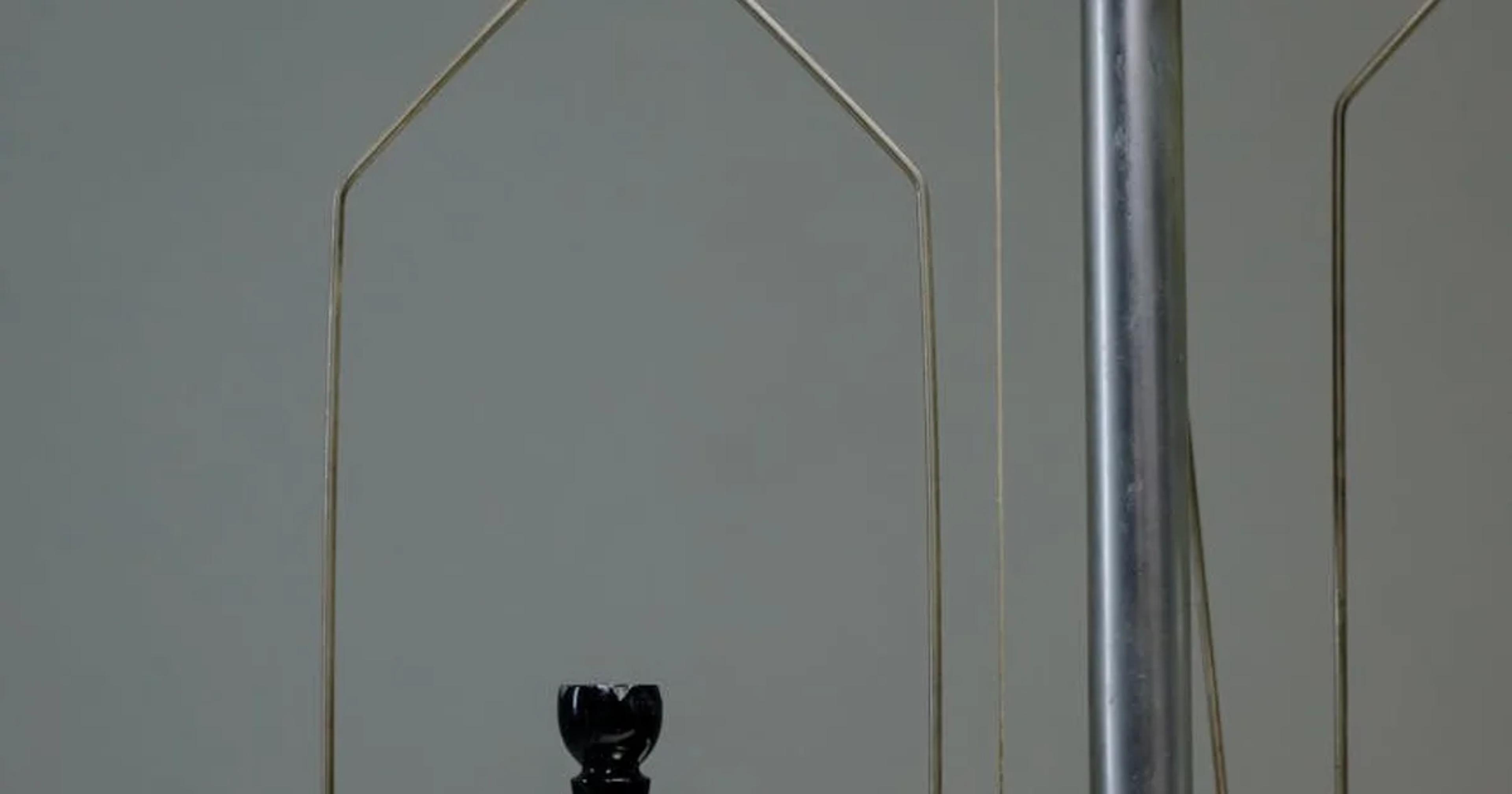 A conceptual image showing the balance between AI hype and its real-world applications.