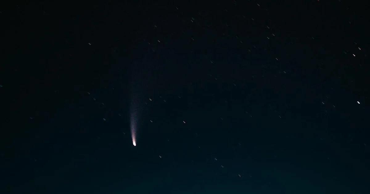An illustration of AI systems monitoring an asteroid trajectory near Earth's atmosphere.