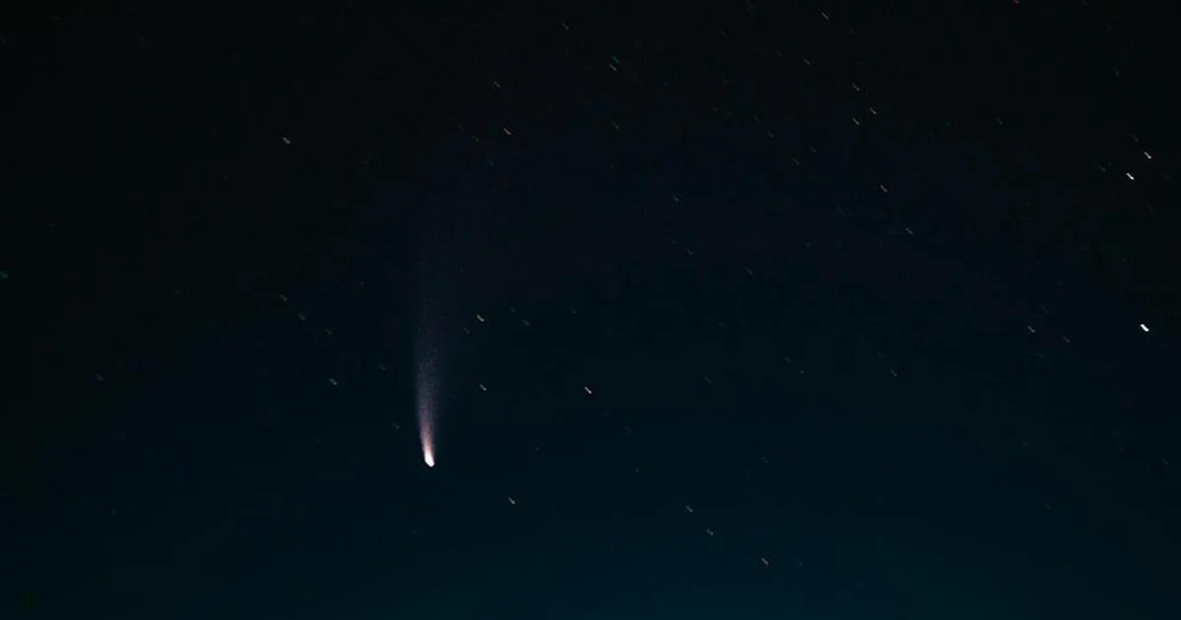 An illustration of AI systems monitoring an asteroid trajectory near Earth's atmosphere.