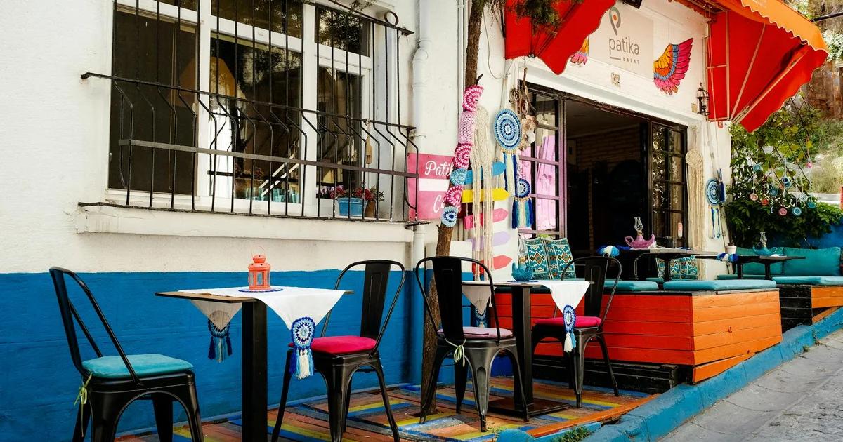 Local business owner interacting with AI tools to manage operations and enhance customer experience in a modern setting.