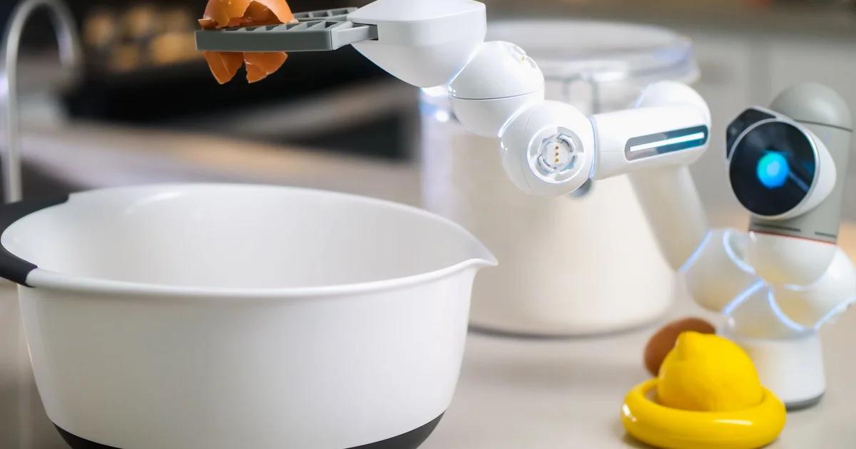 A high-tech industrial kitchen environment featuring automated culinary systems and digital recipe interfaces.