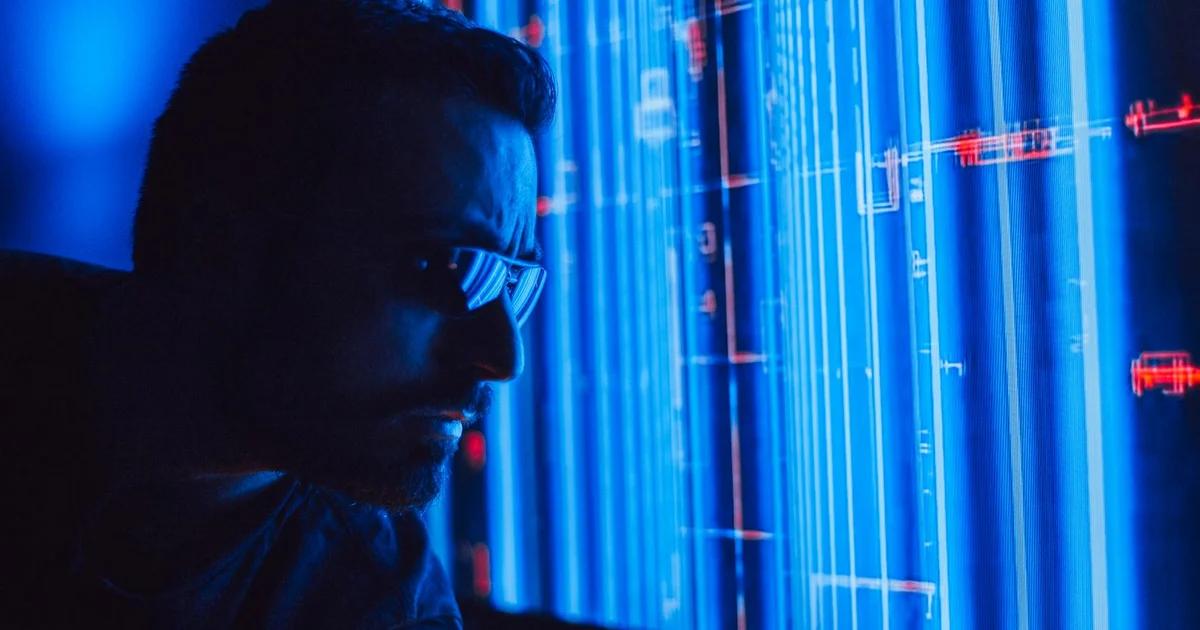 A conceptual image of an HR manager using AI to analyze employee data and strategize, depicting the integration of technology and human resources