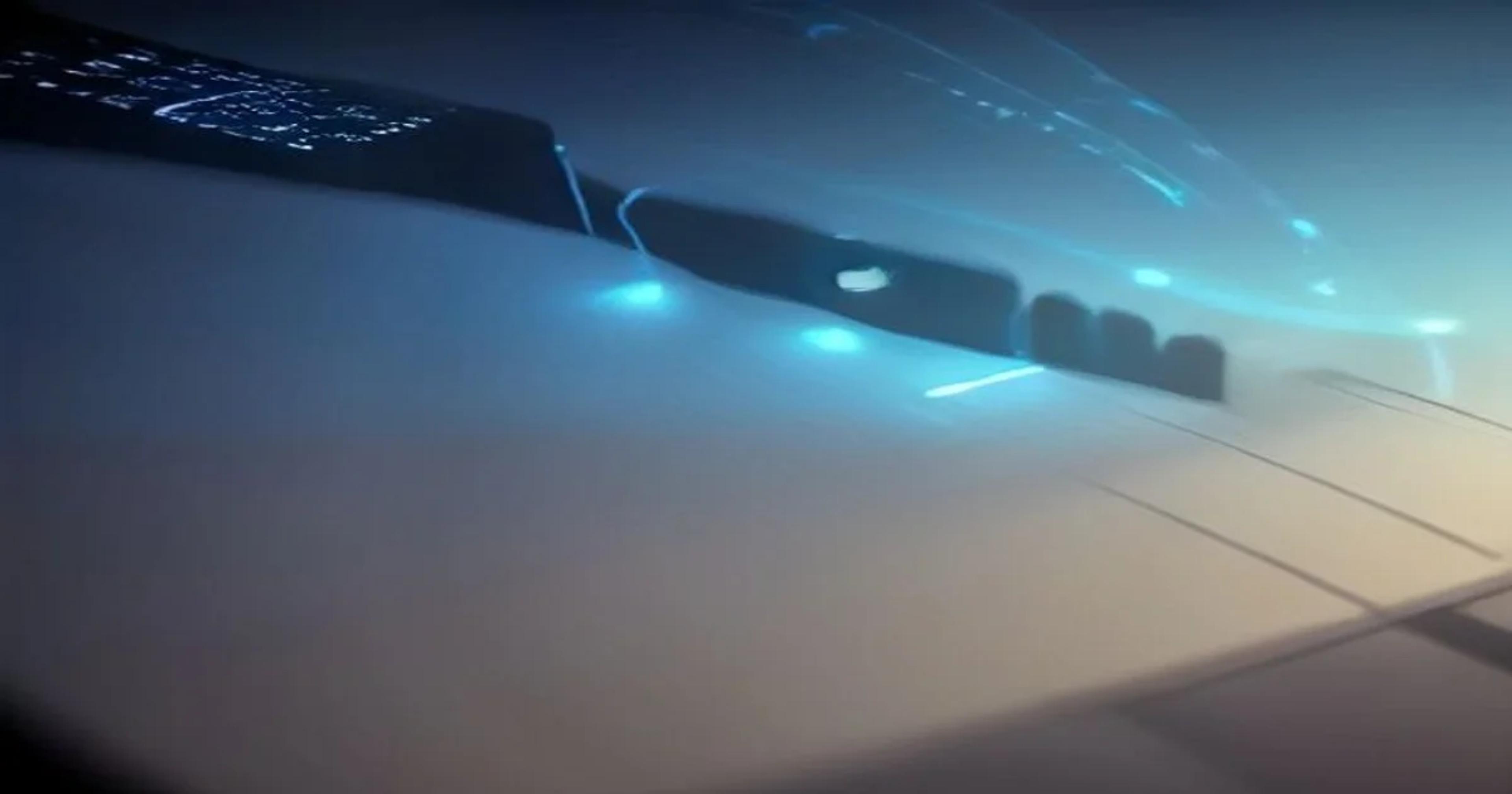 A futuristic digital interface showing adaptive musical notation glowing in a high-tech studio environment.