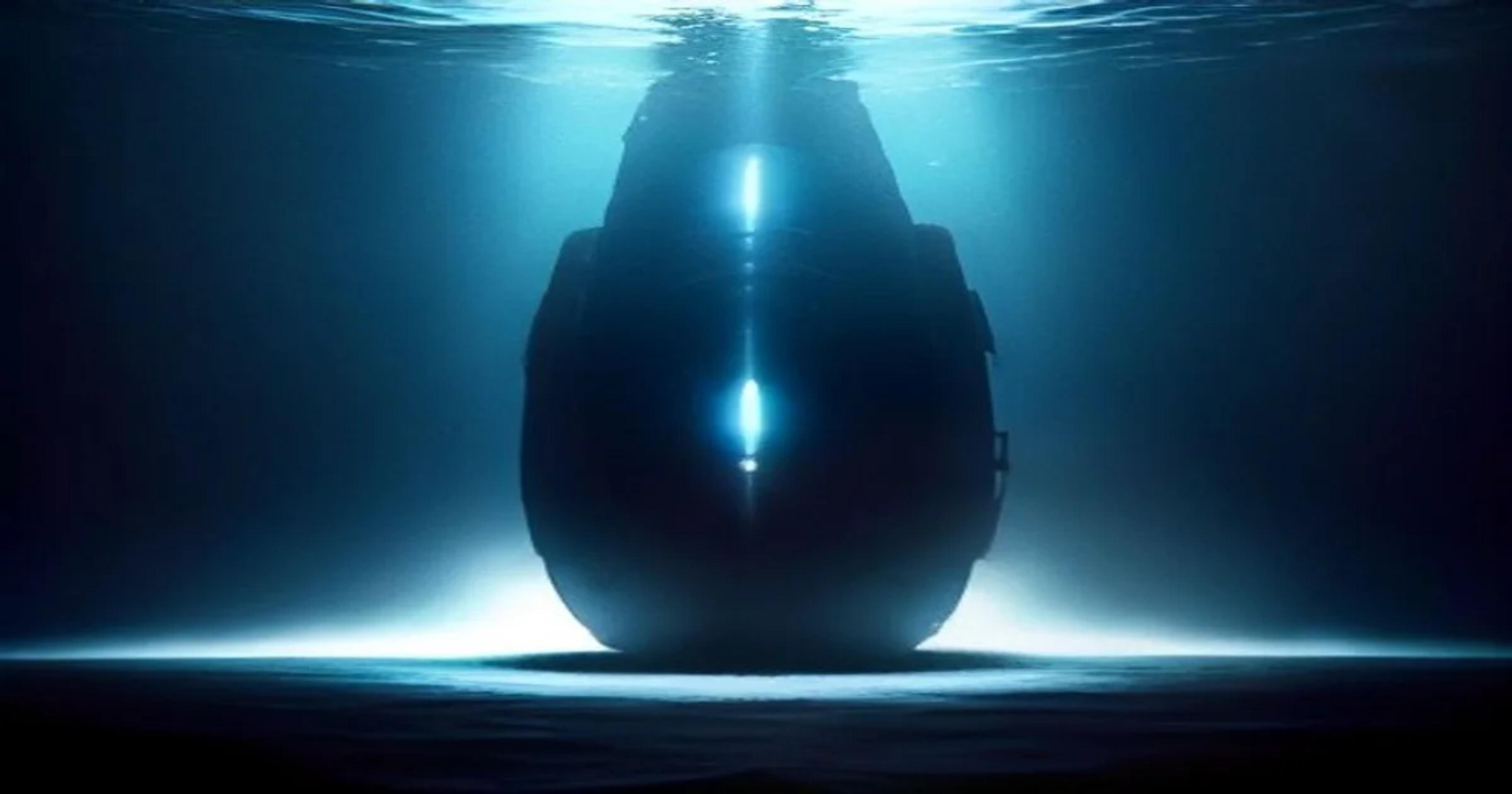 Autonomous underwater robot scanning the dark, mysterious ocean floor using sophisticated sonar technology.