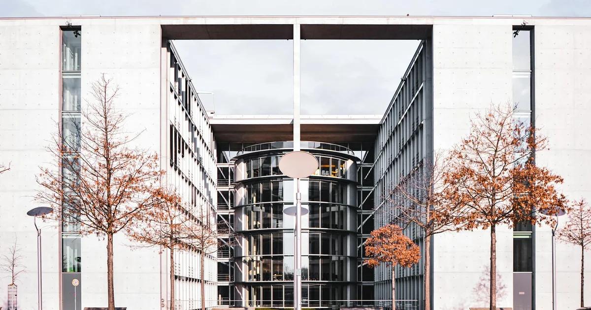 Artificial intelligence transforming a modern public sector building with data visualizations and engaged citizens