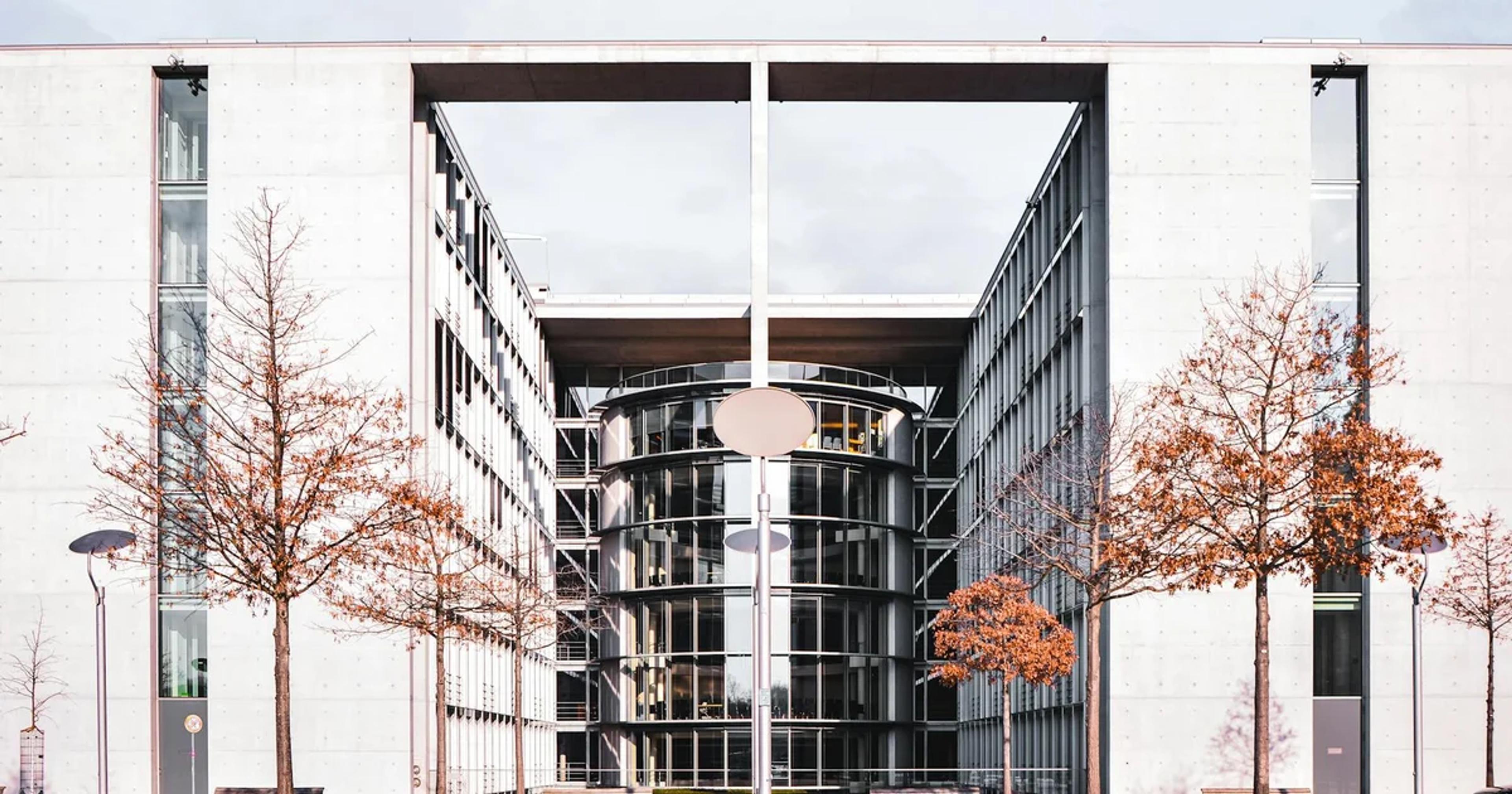 Artificial intelligence transforming a modern public sector building with data visualizations and engaged citizens