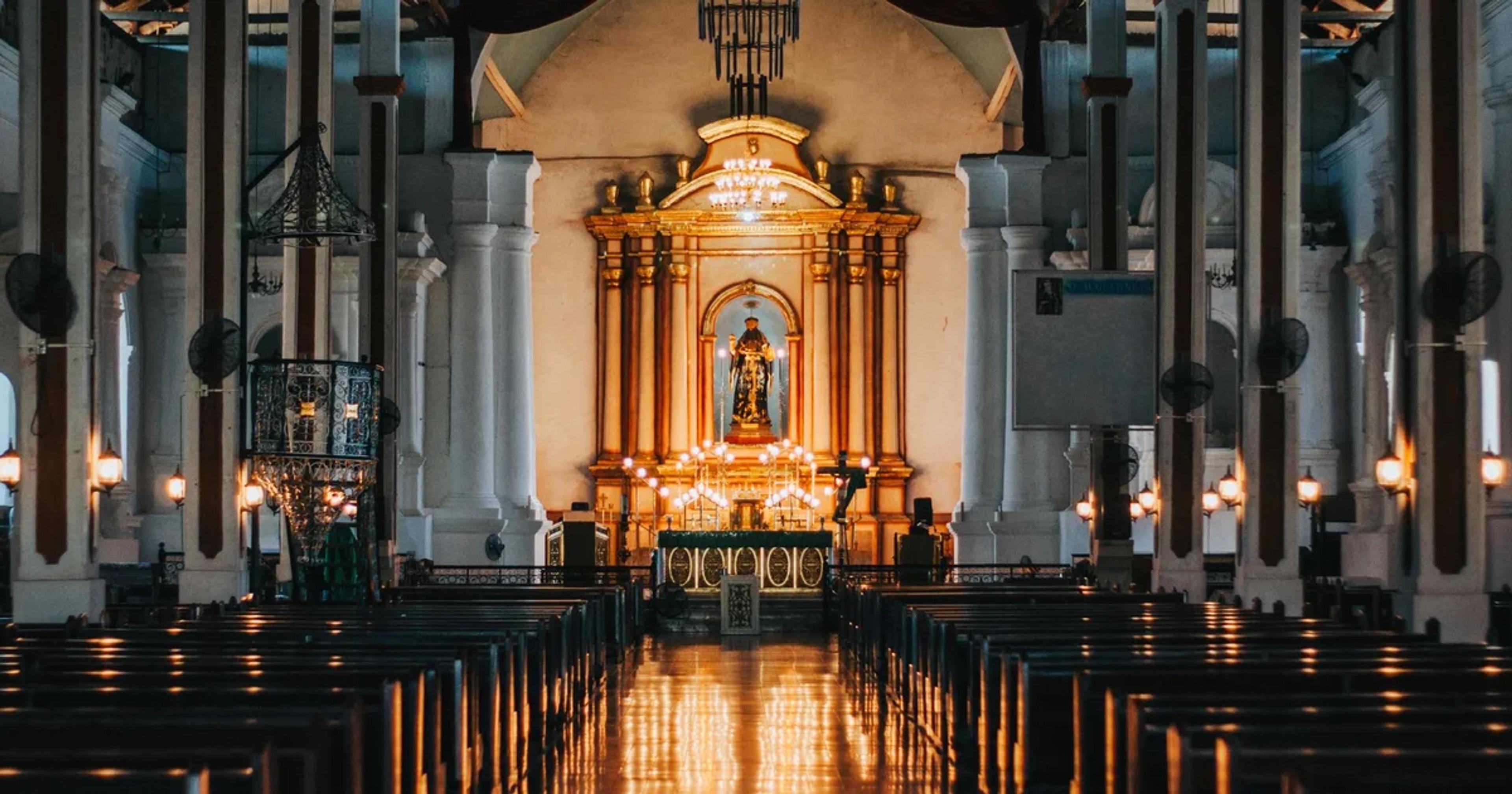 A stylized digital interface interacting with religious symbols in a modern sanctuary.