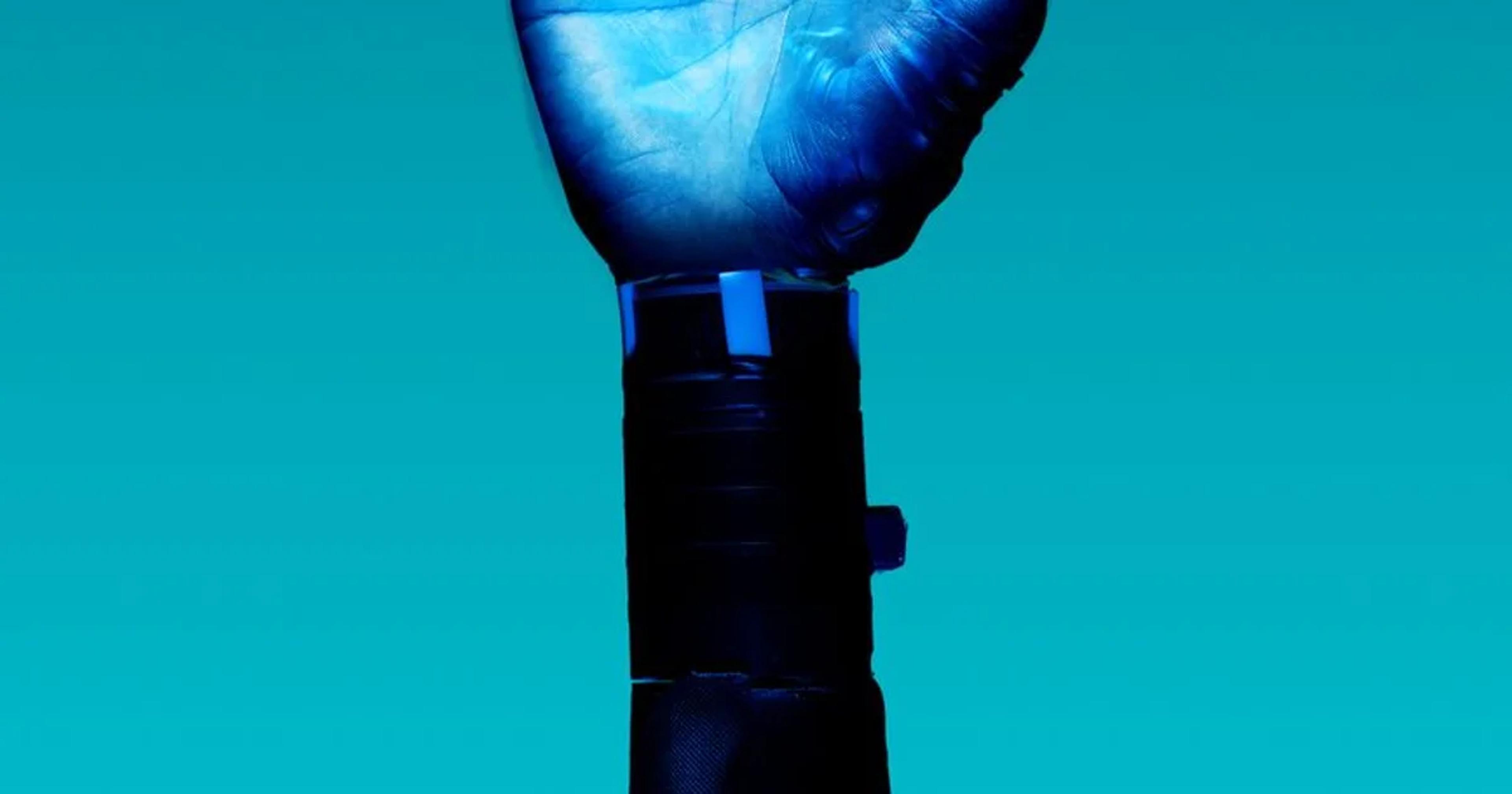 Close up of a high-tech prosthetic limb integrating with advanced AI calibration software.
