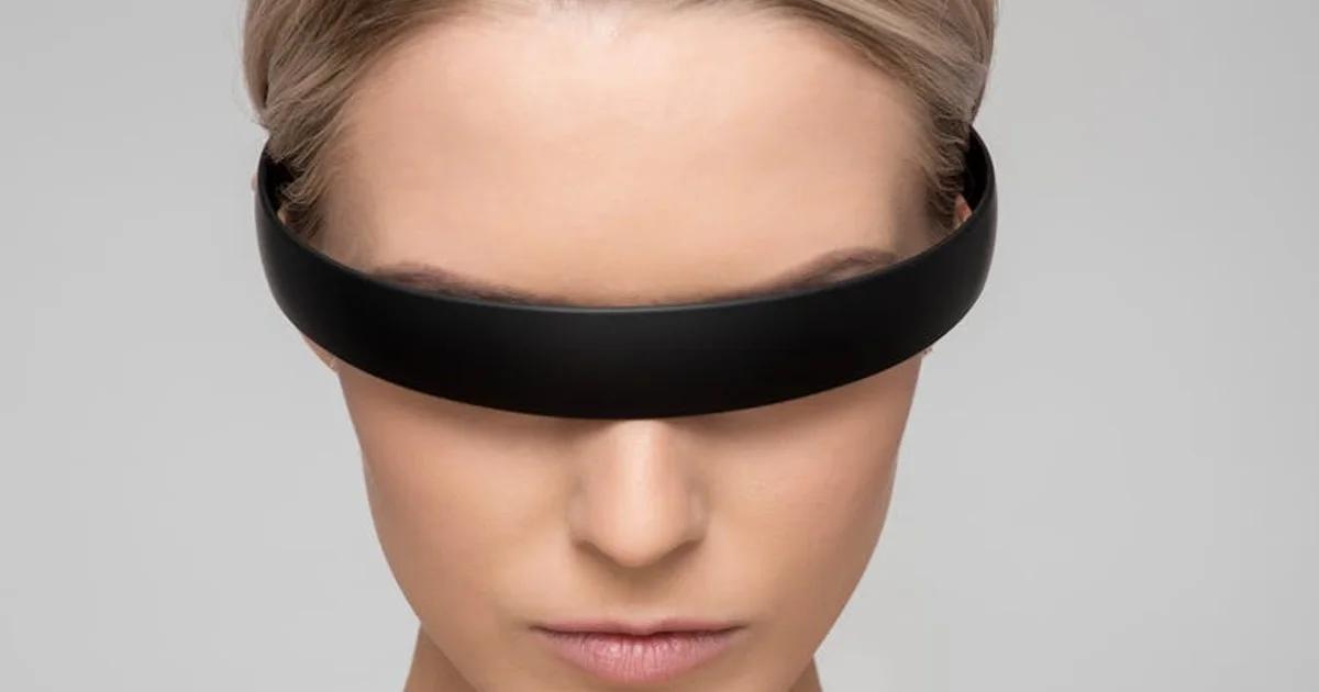 A thought-provoking image of an advanced AI contemplating its existence in a futuristic urban environment, symbolizing the debate over AI moral status.