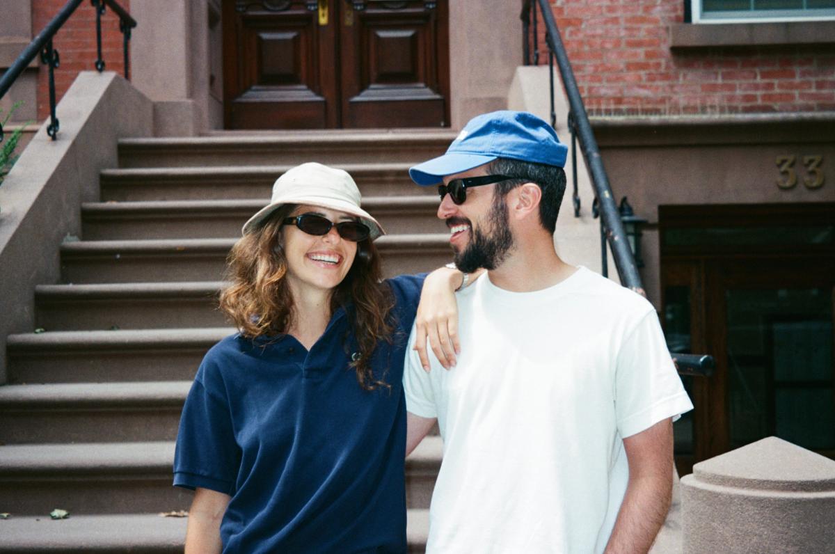 Ellie and Dan outside of their Brooklyn Heights apartment