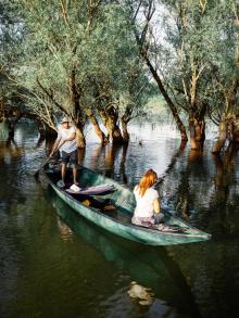 Board a traditional fishing boat (čun)