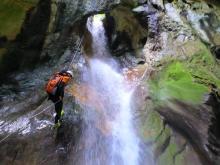 Experience thrilling rappels & waterfall jumps