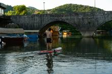 Glide beneath Virpazar’s iconic bridge